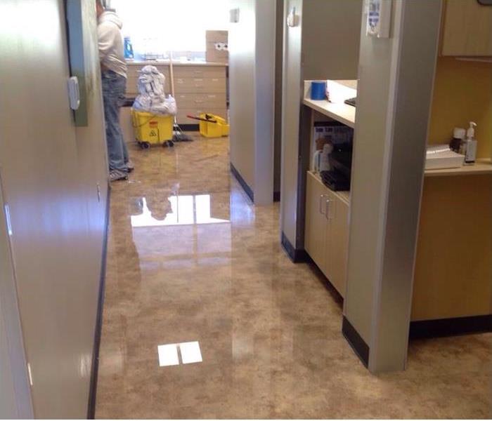 Water on floor of office 