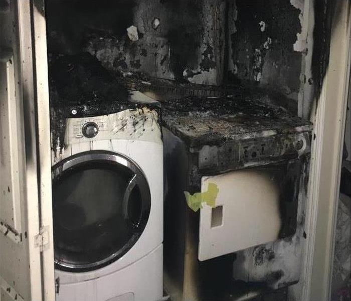 Laundry Room With Fire Damage 